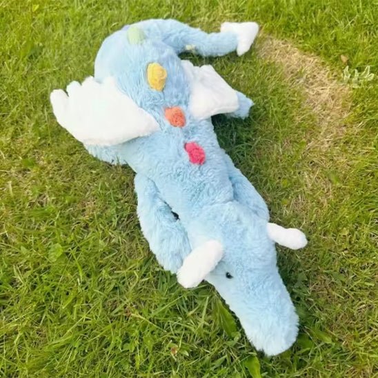 Peluche dragon allie magique