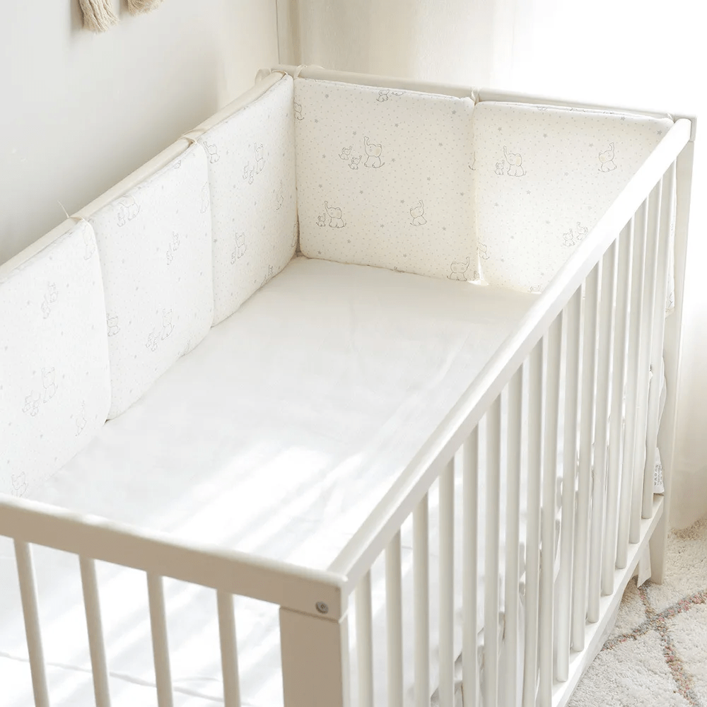 Tour de lit bébé éléphants blancs