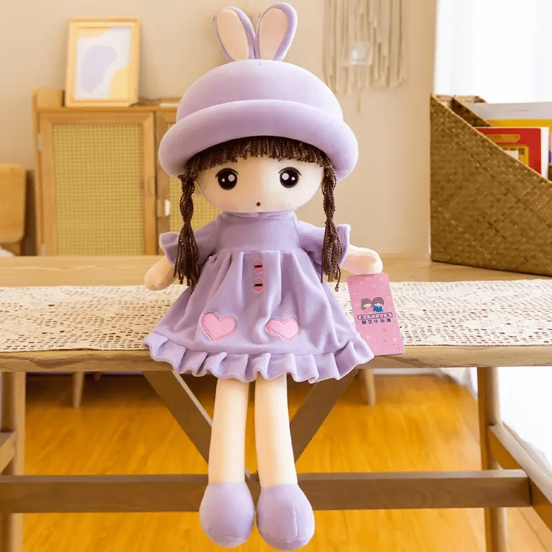 Poupée de chiffon mauve