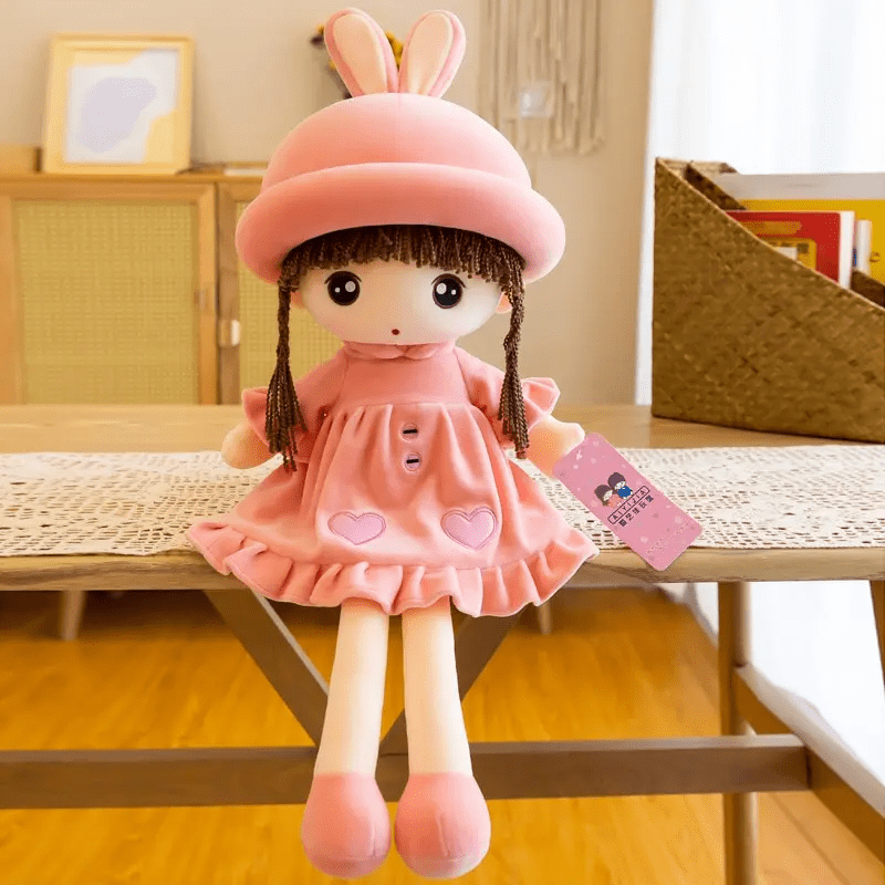 Poupée de chiffon rose