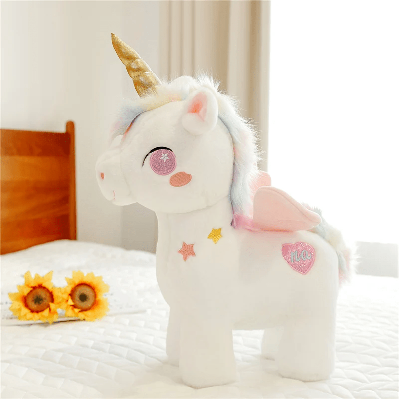 Licorne peluche rose
