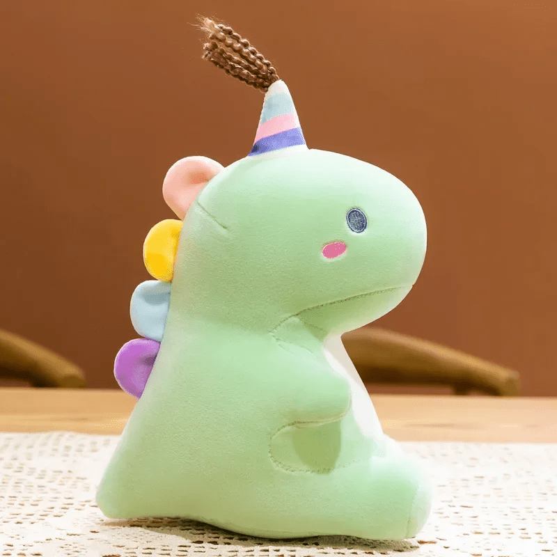 Peluche dinosaure vert