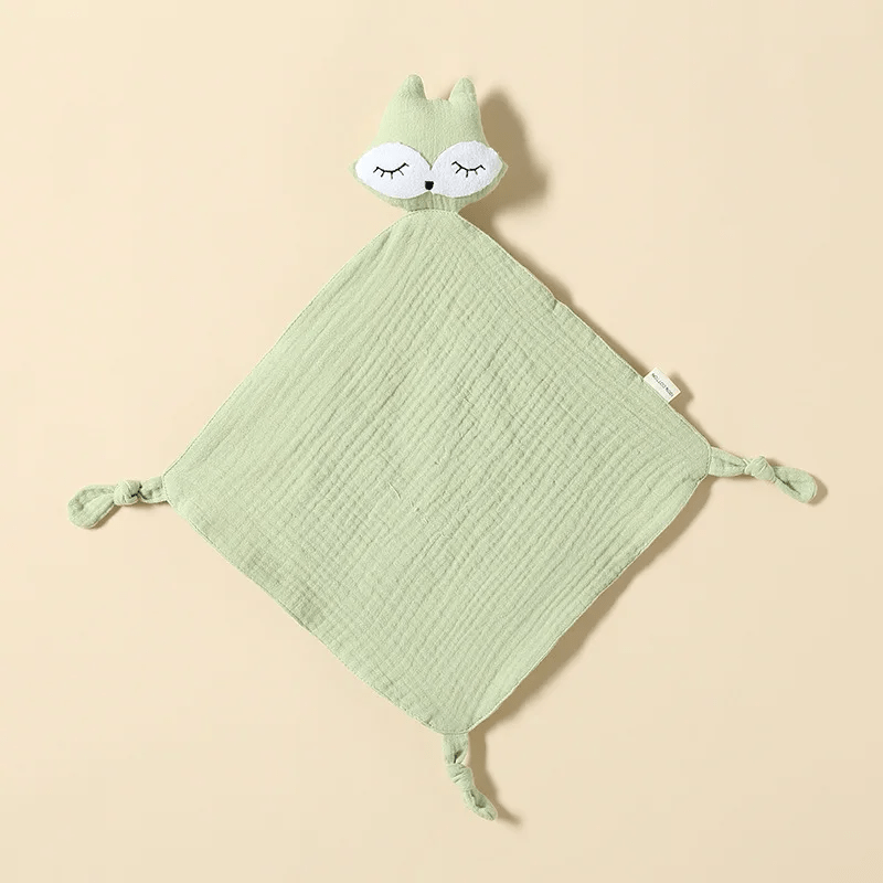 Doudou bébé vert