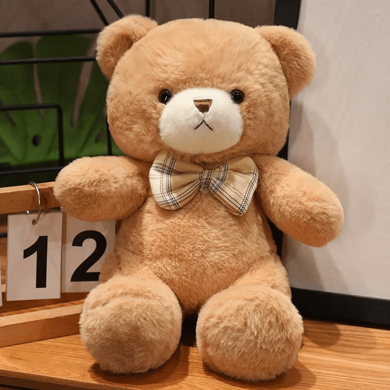 Ours en peluche beige