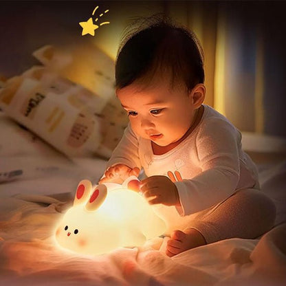 Veilleuse lapin bébé éblouit par lumière