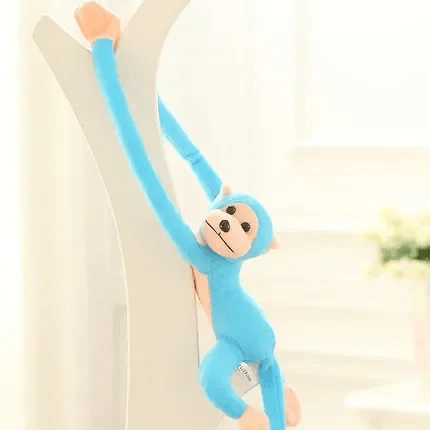 Peluche singe bleu