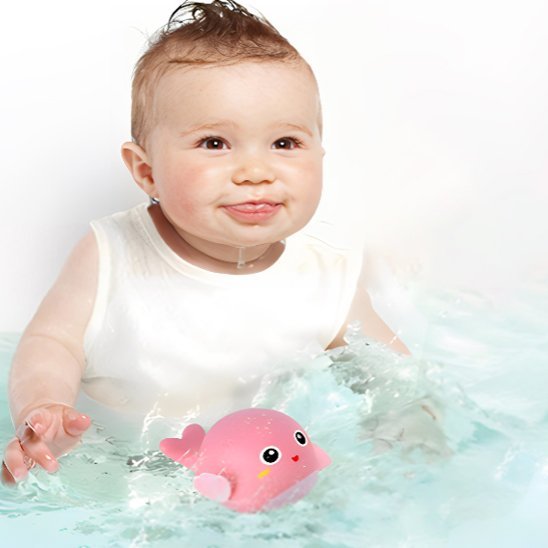 Jouet de bain bébé souriant dans le bain