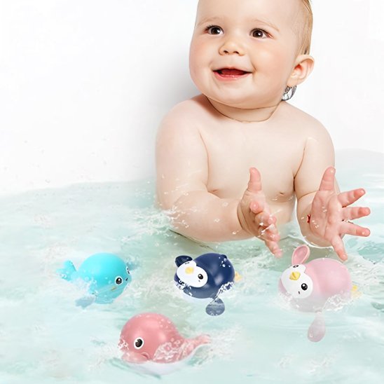 Jouet de bain pour des bébés heureux