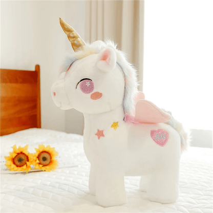 Licorne peluche rose