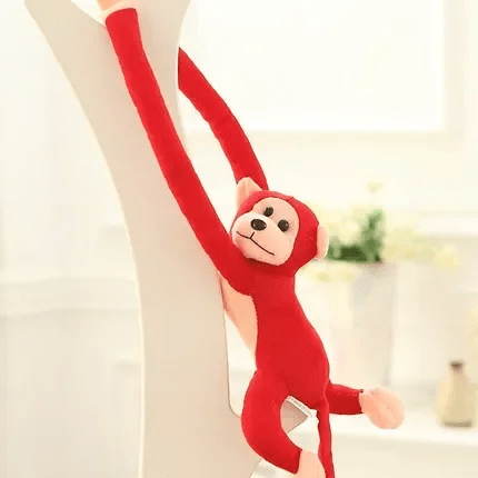 Peluche singe rouge
